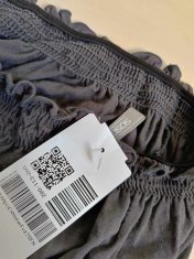 Nikcorp Ženski kombinezon bez rukava, lagan i prozračan za ljeto, udoban kroj za slobodu kretanja, elegantan i casual, crni 34