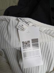 Nikcorp Ženski kombinezon bez rukava, lagan i prozračan za ljeto, udoban kroj za slobodu kretanja, elegantan i casual stil, bijeli XL