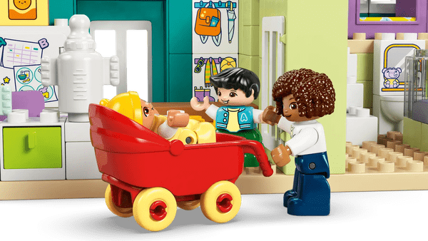 Detalji obiteljske kuće i figure